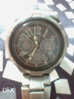 Q&q solar wrist watch.