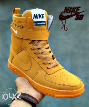 Unpaired Brown Suede Nike High-top Sneaker