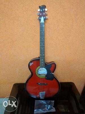 Acoustic guitar. Unused. Practically new with