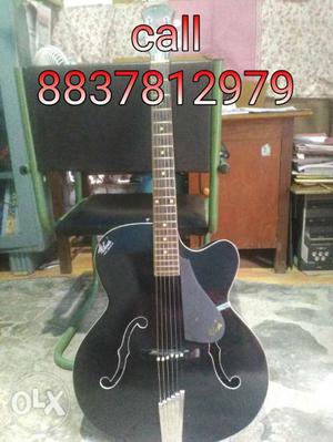 Acoustic hofner Guitar just 1 yr old + free a set of string