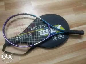 Blue And Purple Tennis Racket And Black Bag