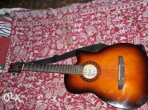 Brown Acoustic Guitar