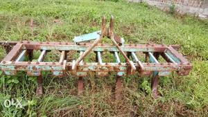 Brown And Green Chisel Plow