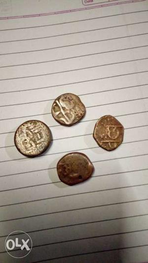 Four Copper-colored Coins