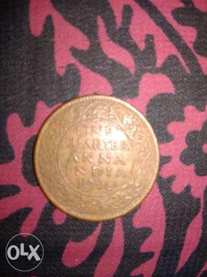 Gold-colored 1 Indian Quarter Anna Coin