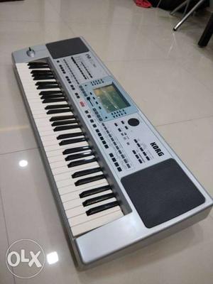 Gray And Black Korg Electronic Keyboard