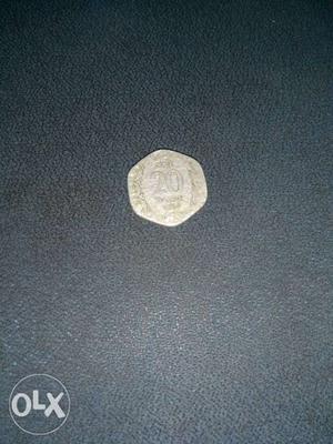 Hexagonal Copper-colored 20 Indian Paise Coin