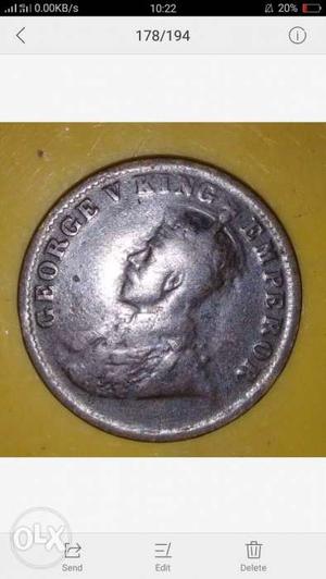 It is an old coin from GEORGE V KING EMPEROR 