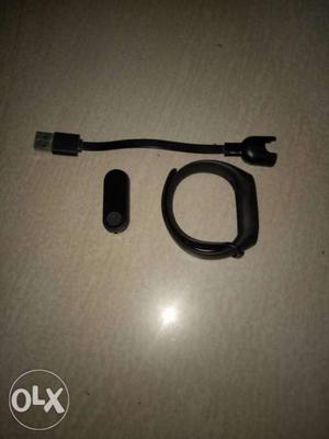 Its a mi band M2series with cord charger and band