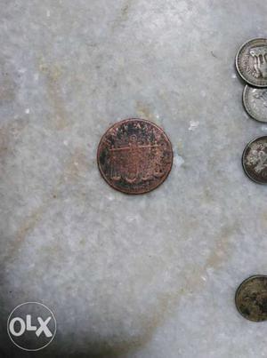 Old half Anna coin at lowest price. one side of
