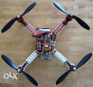 Red And White Quadcopter Drone