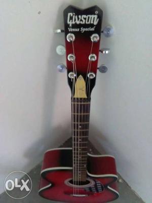 Red Givson Guitar Headstock