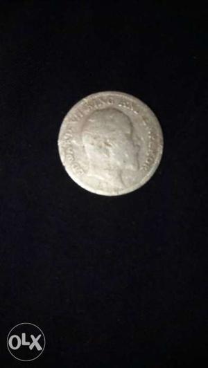 Round Silver-colored Coin