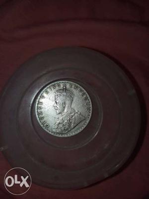 Round silver British Indian coin 