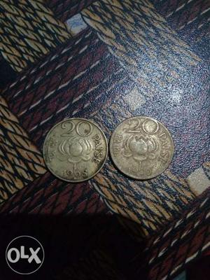 Two 20 paisa coin,