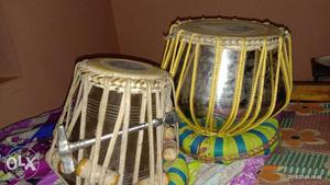 Two Brown Percussion Instruments