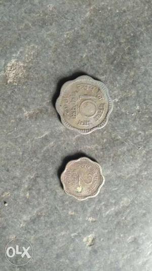 Two Scalloped Edge Silver-colored 10 Indian Paise Coins