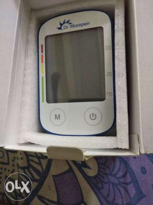 White And Blue Glucometer With Box