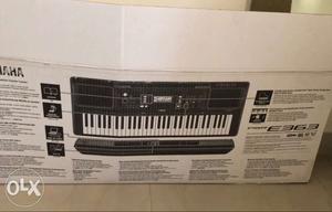 Yamaha keyboard E363 with cover and stand