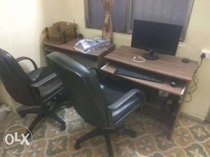 2 computer tables and 2 chairs