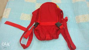 Baby carrier, red colour, gently used, adjustable