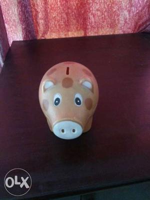 Beige Pig Coin Bank