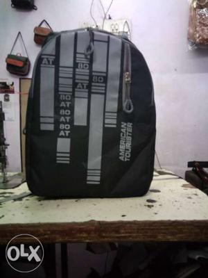 Black And Gray American Tourister Backpack