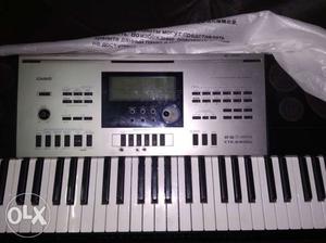 Black And Silver Casio Electronic Keyboard