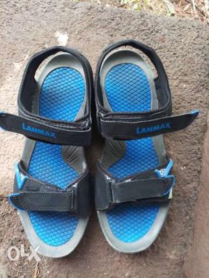 Blue-and-black Nike Velcro Strap Sandals