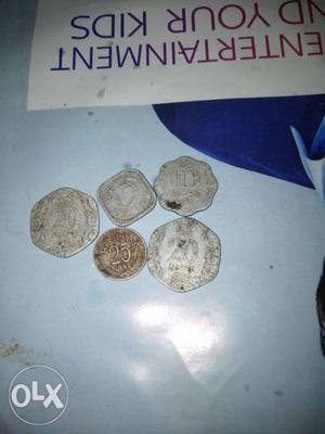 Five Silver-colored Coins