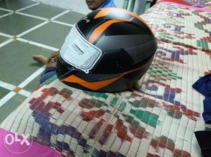 Orange, Gray, And Black Full-face Helmet