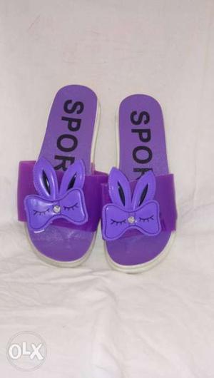 Pair Of Purple-and-white Nike Slide Sandals
