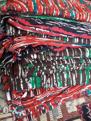 Red, Green, And Black Textile