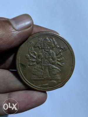 Round Copper-colored Coin With Hanuman's Profile