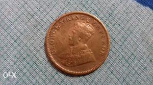 Round Copper-colored George V King Emperor Coin