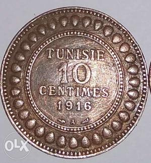 Round  Silver-colored 10 Tunisie Centimes Coin