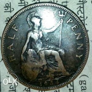 Round  Silver-colored Half Penny Coin