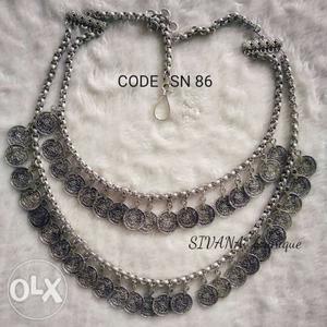 Silver And White Beaded Necklace