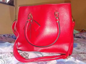 Stylish red colour purse. Very elegant and