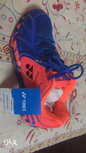 Unpaired Red And Blue Yonex Tennis Shoe