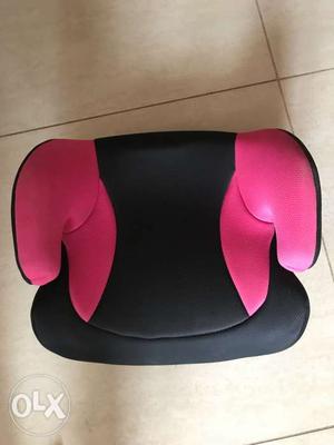 Baby's Black And Pink Booster Seat