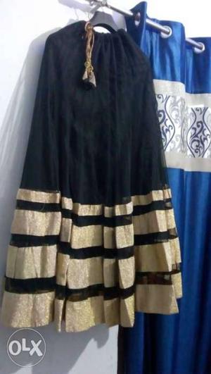 Black and golden lehnga only one time wear..