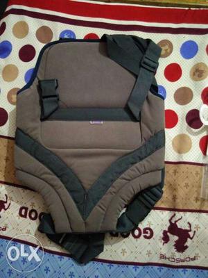 Brown And Black Baby Carrier