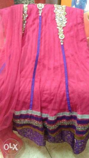 Frock suit with pyzami and dupatta.Fabric - net.