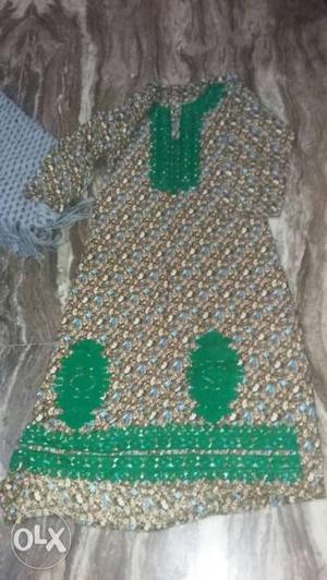 Green And White Knitted Textile