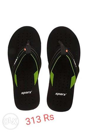 Pair Of Black-and-green Sparx Flip-flops With Text Overlay