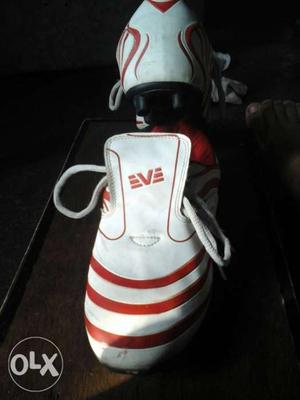 Pair Of White-and-red Eve Cleats