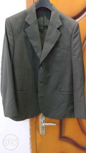 Raymond Medium Sized Suit/Blazer for  Rupees.