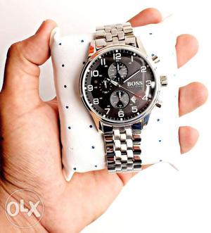Round Silver Chronograph Watch With White Strap