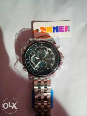 Round Silver Chronograph Watch of skmei brand